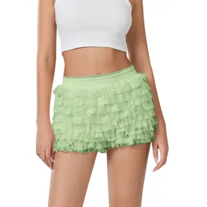 Detailed view of light green ruffled lace low-waist shorts skirt with layered waves, sweet lolita style.