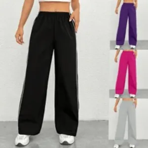 Women casual loose track pants with side stripes, comfortable straight leg sweatpants activewear.