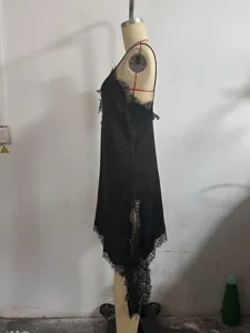 Black lace slip dress, sexy satin camisole featuring delicate lace trim, detailed clothing view.