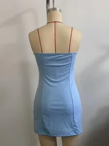 Back detail of a light blue strapless mini dress with red thin straps, fitted cut.