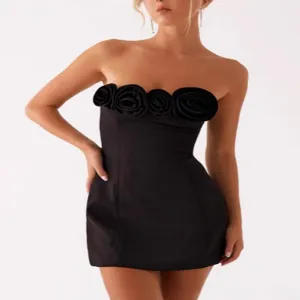 Black strapless mini dress with 3D fabric rosettes, elegant slim fit for summer party.