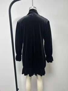 Black velvet long sleeve dress with ruffle hem, vintage mock neck detail for women.