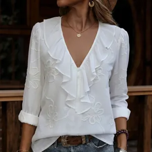 Elegant solid white long sleeve V-neck ruffle embroidered women blouse main view.