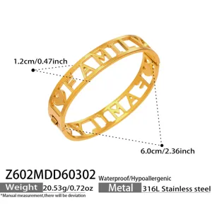 Detailed view of the gold stainless steel cutout family bangle with precise dimension specs.