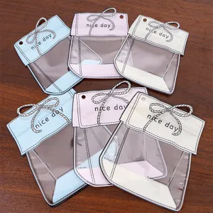 Süße transparente Beutel mit Schleife und nice day Druck für Schmuck und DIY Basteleien Verpackung.
