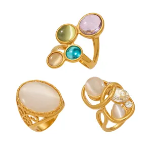 Set di anelli in acciaio inossidabile bagnato oro pietra occhio di gatto multicolore design elegante.