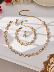 Elegante juego de joyas collar pulsera pendientes de acero inoxidable dorado.