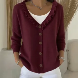 Casual women's V-neck button down knit cardigan sweater with elegant ruffle trim for autumn wear.