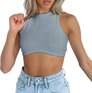 Close-up detail of the ribbed knit sleeveless crop top, featuring a classic round neckline.