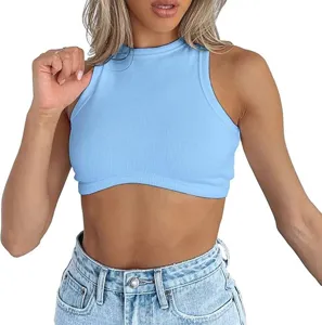 Close-up detail view of the light blue ribbed knit crop top, showing its slim fit texture.