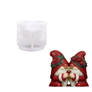 Christmas gnome silicone mold and resin finished product set for DIY crafts and holiday gifts.