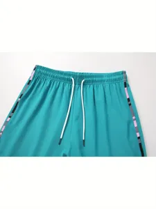 Close-up of women casual sports shorts waistband, elastic drawstring, side stripe details.
