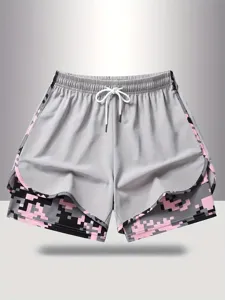 Details view of women's anti-glare sports shorts with elastic drawstring and pixel print.