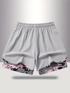 Detail view of women's athletic shorts featuring a contrasting pixel camo inner layer.