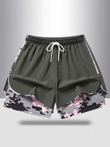 Women athletic fitness running shorts with elastic drawstring and fake two piece design.