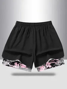 Detailed view of women two-in-one sports shorts with pixel camo inner layer and elastic waist.
