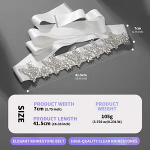 Sparkling crystal bridal belt detail, elegant white satin ribbon with intricate rhinestones.
