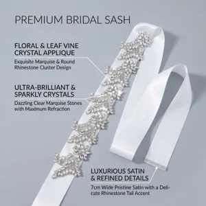 Elegant bridal rhinestone sash with floral crystal applique, luxurious satin belt for wedding party.