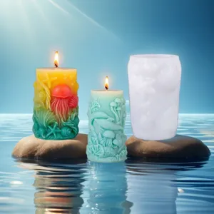 Detailed view of ocean themed relief candles and matching silicone mold for DIY craft making.