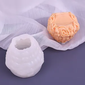 Silicone mold for handmade scented candles and diffuser stones with heart rose floral design.