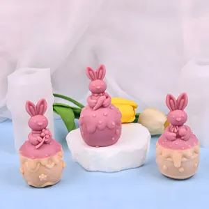 Cute 3d rabbit silicone mold details showing handmade scented candle and plaster figures.