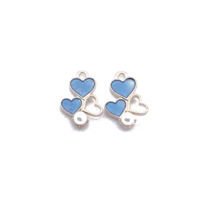 Blue glitter heart alloy charm DIY jewelry pendant accessory detail view close up shot