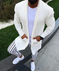 Detailed view of men's white ribbed knit cardigan with lapel and pockets, perfect autumn wear.