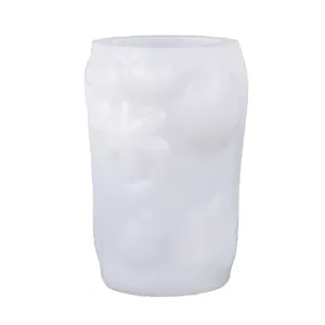 Cylindrical marine silicone mold with starfish and shell embossed patterns for DIY candles and crafts.