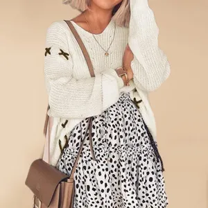 Detail view of women casual V-neck long sleeve knit sweater showcasing texture and stylish fit.