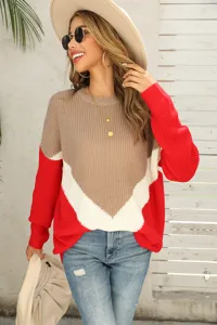 Detailed view of women's colorblock knit sweater featuring casual drop shoulder design and chevron stripes.