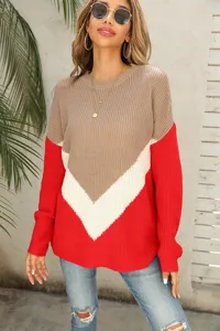 Detailed shot of the color-block knit sweater showcasing chevron stripes and dropped shoulders.