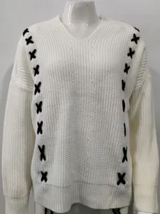 White V-neck knit sweater with black cross stitch detail, long sleeve casual pullover top.