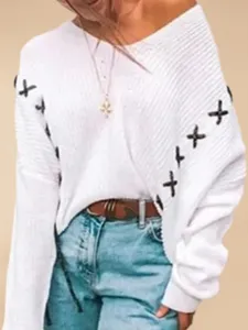 White off shoulder knit sweater with cross lace up sleeves for women winter fashion daily wear.