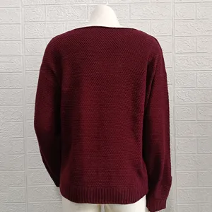 Back detail view of solid color long sleeve V-neck knitted sweater in elegant wine red tone.