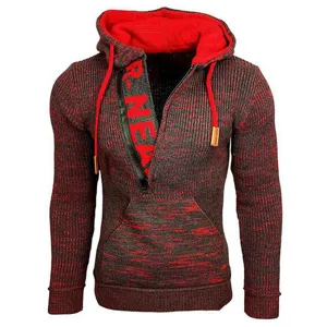 Men's knitted hooded sweater detail, showing the textured red and black heathered fabric.