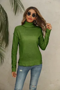 Detailed view of women green turtleneck sweater, soft knit texture, long sleeves design.