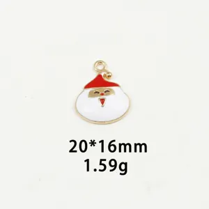 Close-up view of the cute Santa Claus pendant detail, showing the enamel color and alloy loop design.