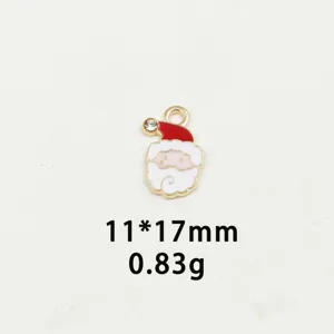 Close-up detail of a cute Santa Claus enamel charm pendant with sparkling rhinestone trim.