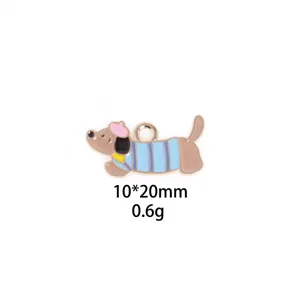 Detailed view of the cute enamel dog charm with striped shirt, showing fine craftsmanship.