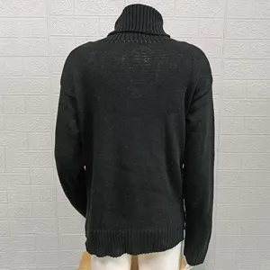 Back view detail of solid black turtleneck long sleeve knitted sweater, ribbed hem.