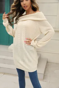 Close-up detail of casual off-shoulder beige knit sweater with long sleeves and cozy texture.