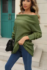 Detail shot of women's off-shoulder green knitted sweater, showing soft texture and cozy fit.
