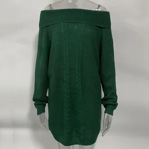 Off-the-shoulder dark green cable knit sweater detail, cozy winter long sleeve pullover.