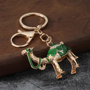 Exquisite alloy rhinestone camel keychain, stylish green enamel bag charm for car keys.