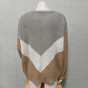Back view of a color-block striped knitted sweater with dropped shoulders for autumn style.