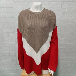 Contrast color knit sweater featuring a dropped shoulder design and chic V-stripe pattern.