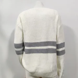 Back view of white knit sweater with grey stripes, detailed texture close-up.