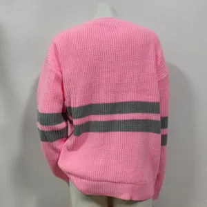 Back detail view of women pink knitted sweater with stylish grey horizontal stripes.