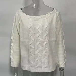 White off-shoulder cable knit sweater, classic twisted pattern, elegant casual top detail.