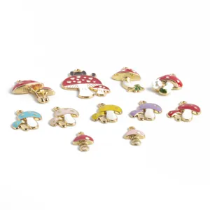 Cute enamel mushroom metal charms for DIY jewelry making, necklaces, and keychains.
